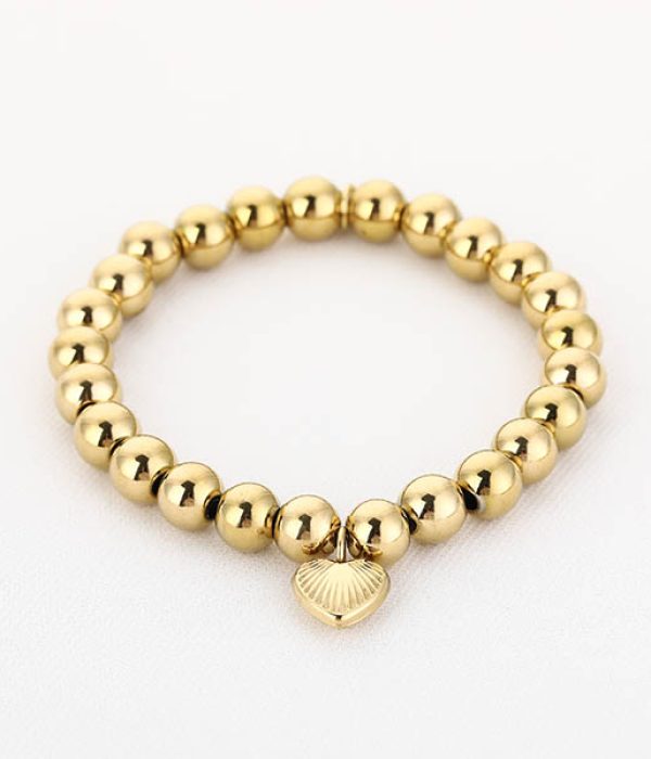 Michelle Bolletjes Armband RVS Cuore goudkleurig 17,5 cm met hartbedel op witte achtergrond