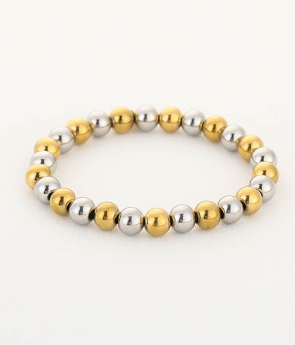 Michelle Bolletjes Armband RVS Nova goud en zilver 17,5 cm op witte achtergrond